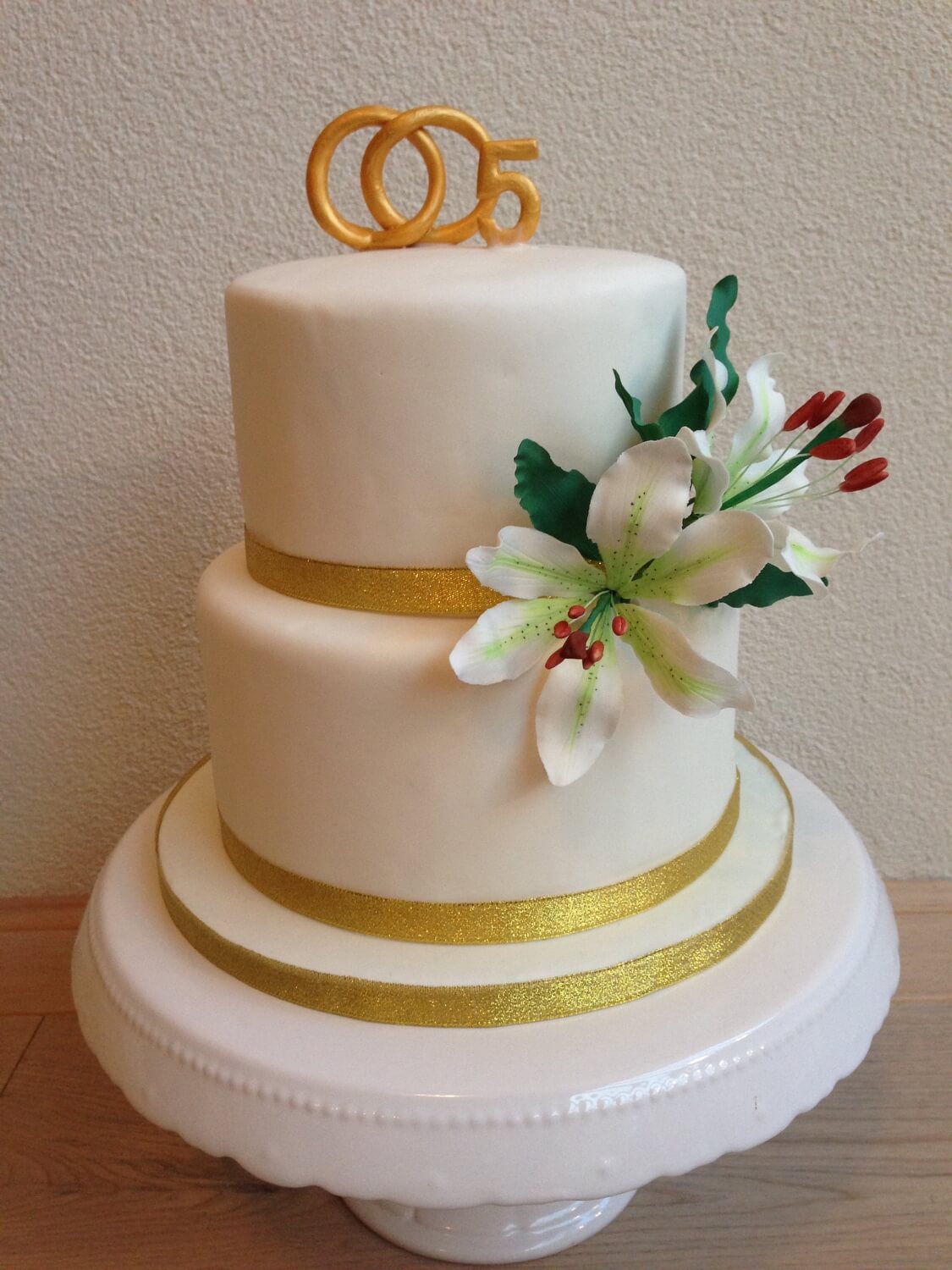 Bruidstaart ringen suikerbloemen